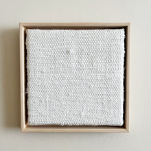 Load image into Gallery viewer, small square textural white weaving floating in a light wood frame
